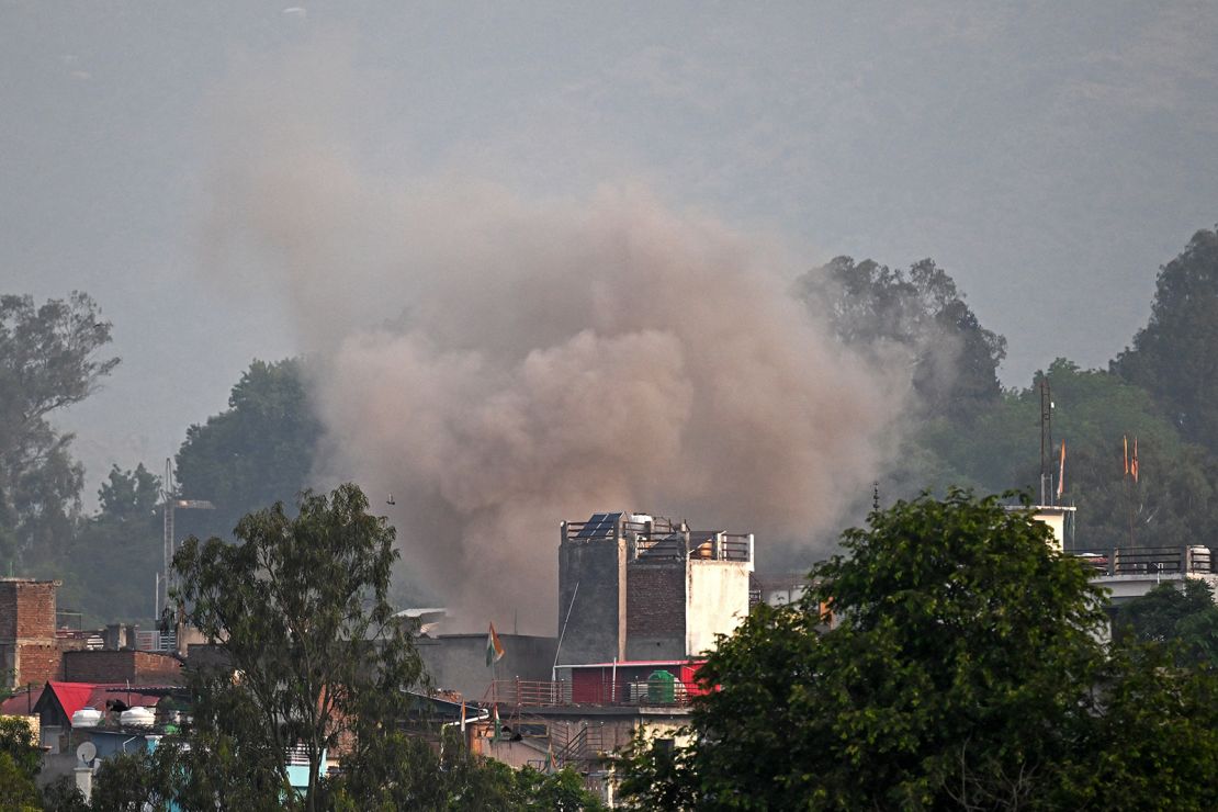 Smoke billows after an artillery shell landed in Poonch district in India's Jammu and Kashmir region on May 7, 2025.