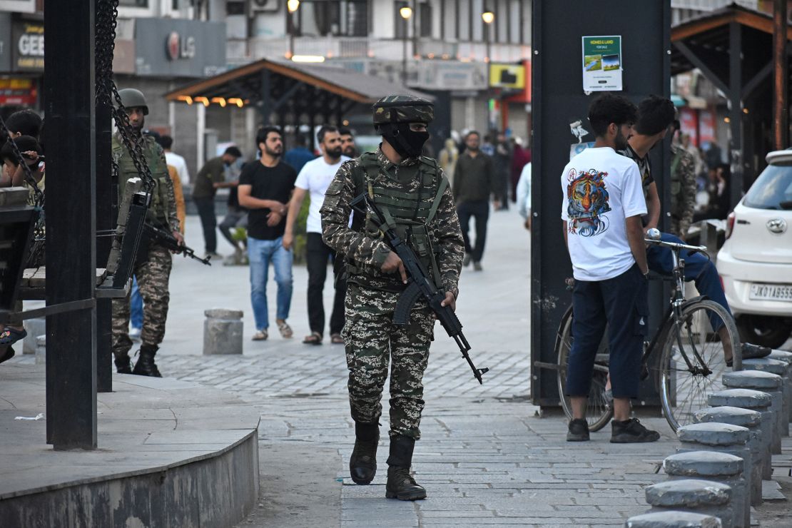An Indian paramilitary soldier patrols the street in Srinagar, India-administered Kashmir on May 11, 2025.
