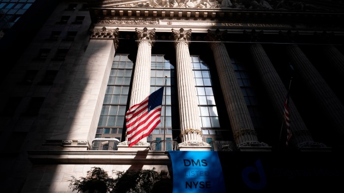 An American flag hangs at the New York Stock Exchange