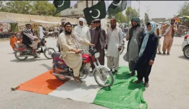 Pakistani folk desecrating Irish flag mistaking it for Indian flag