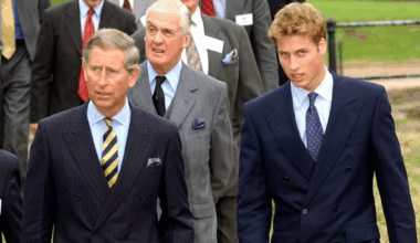King Charles and Prince William wearing suits and ties at St Andrews