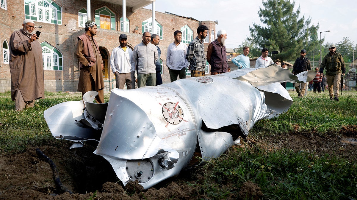 Metal debris lies on the ground in India