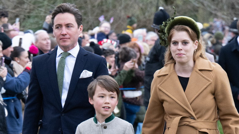 Edoardo Mapelli Mozzi looking thoughtful, Christopher Woolf Mapelli Mozzi and Princess Beatrice smiling