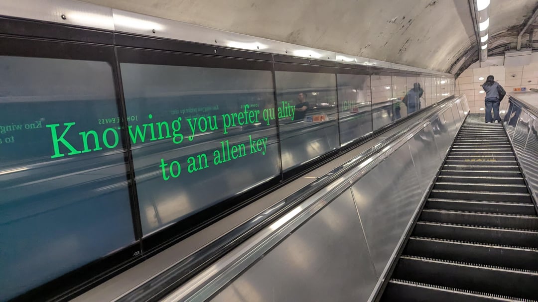 John Lewis ad at Oxford Circus, as people head out of the Ikea exit