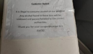Puzzling customer notice on a supermarket bog bin...
