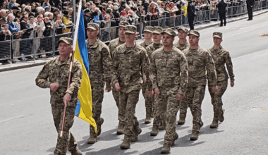 Ukrainian soldiers march in the VE Day Parade along Whitehall.