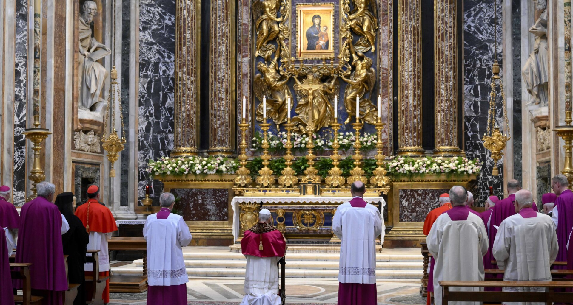 Pope Leo XIV prays before the icon of Mary, ‘Health of the Roman People,’ in Basilica of St. Mary Major