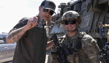 Secretary of Defense Pete Hegseth receives a coin