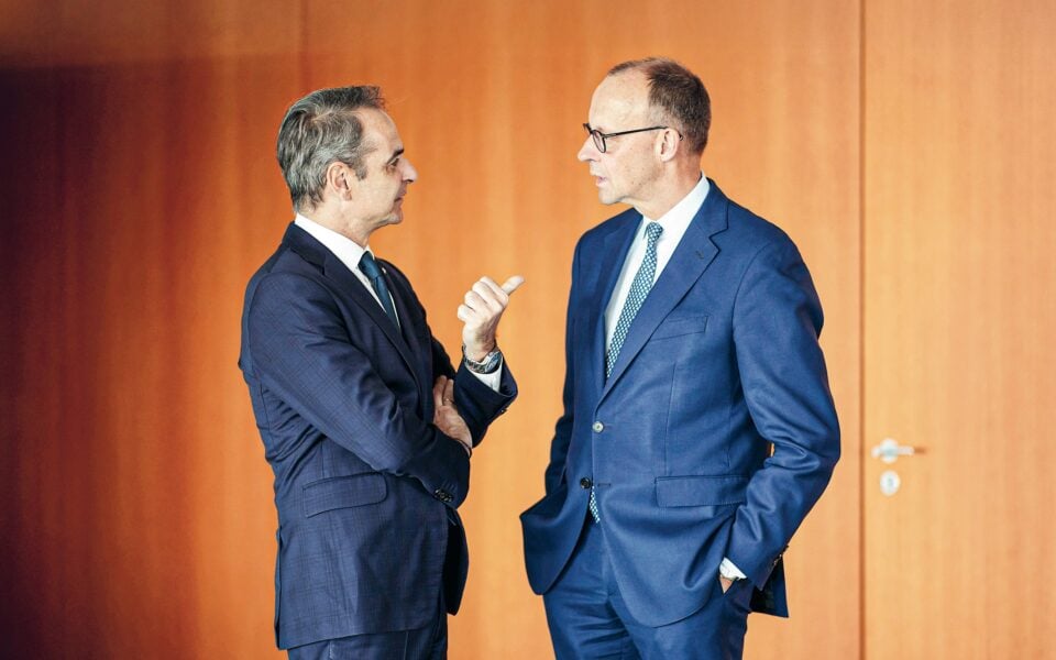 German, Greek PMs stay tough on migration