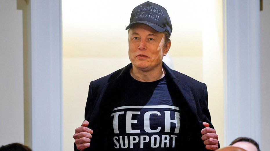 Elon Musk wears a "Tech Support" shirt