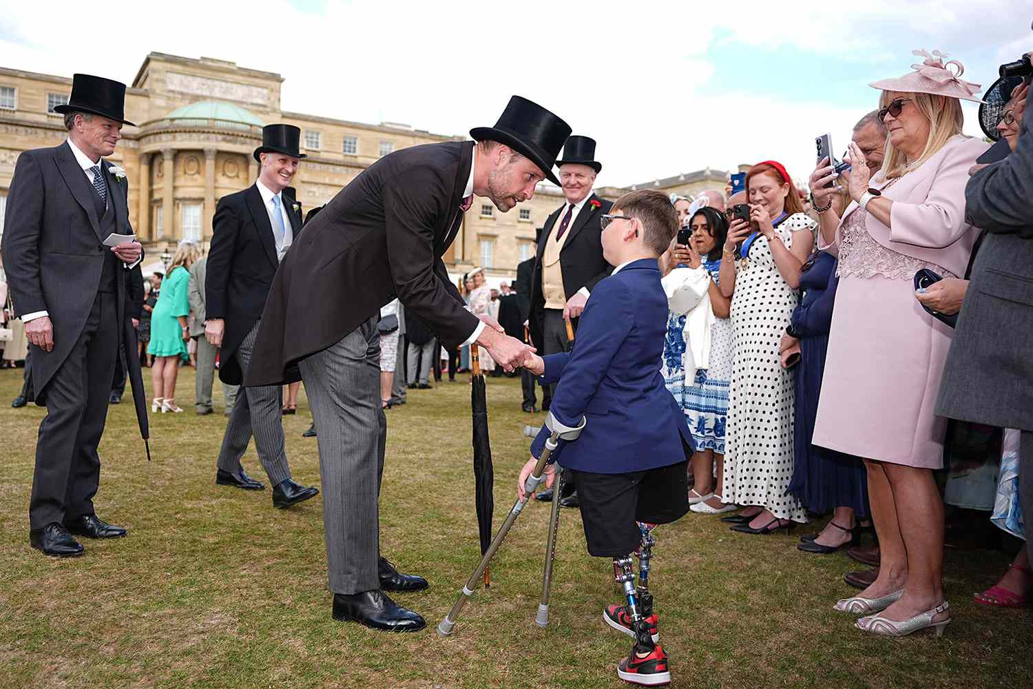 Prince William Meets Boy Who Missed Previous Garden Party Due to Traffic