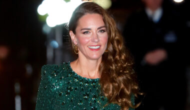 Kate Middleton has long curly brown hair and wears a green sequin gown for the Royal Variety Performance at London's Royal Albert Hall on November 18, 2021