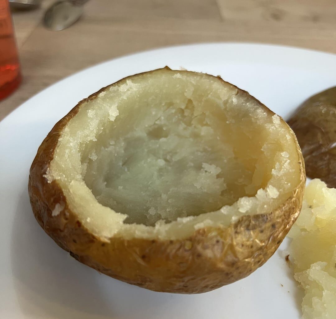 Is it a coconut? Or is it a precision carved baked potato?