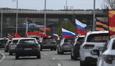 Russian immigrants parade in Sweden with flags
