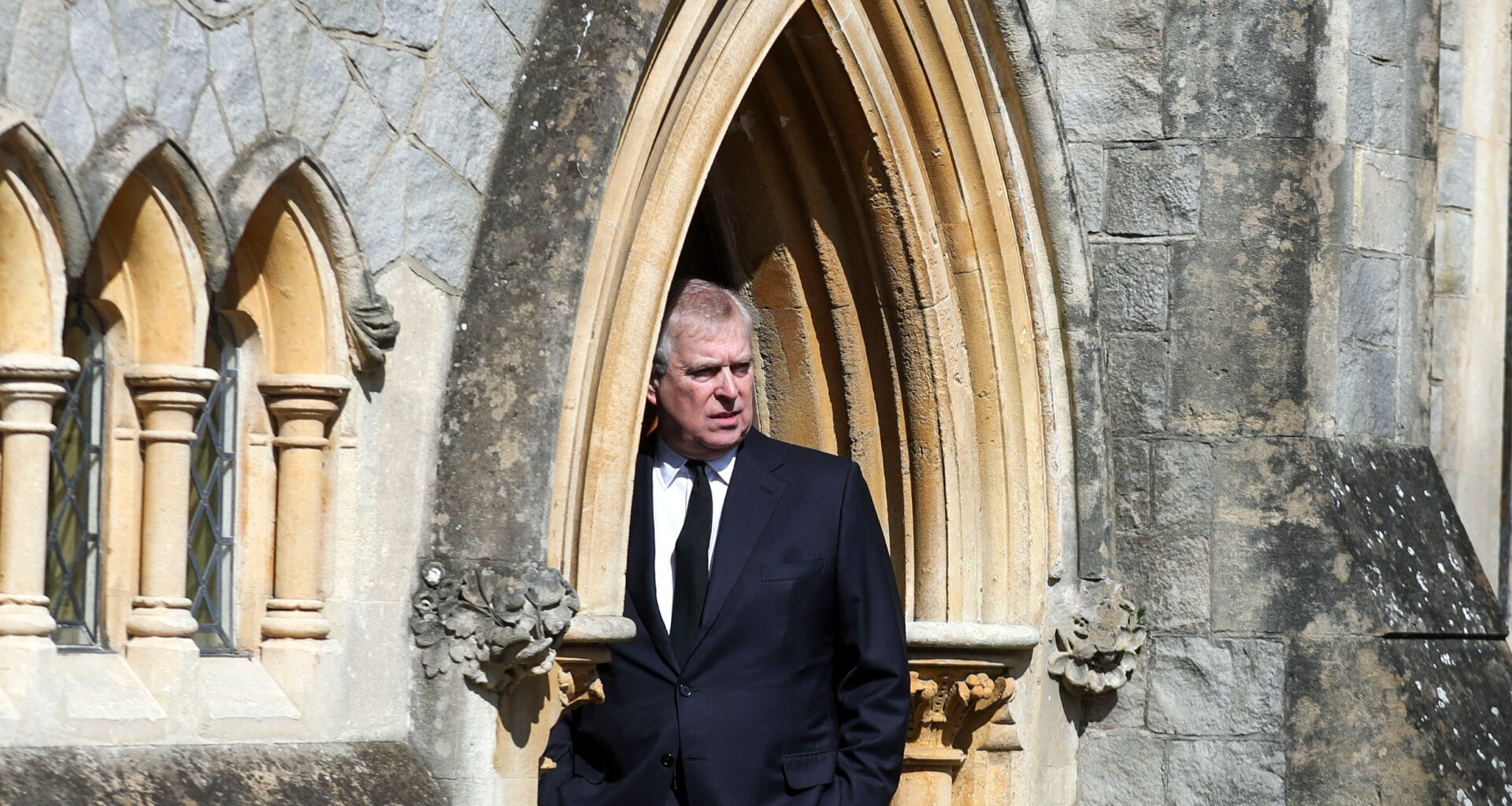 Prince Andrew standing in the doorway of the chapel at Royal Lodge