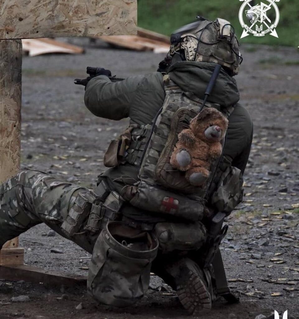 Operator from the Special Operations Forces of Ukraine - "I found him on a destroyed playground in [the] Donetsk region. Among rubble, empty swings and silence, a little bear lay. I took him with me. I couldn't leave him. Since then, he has always been with me, silent, holding on, looking forward."
