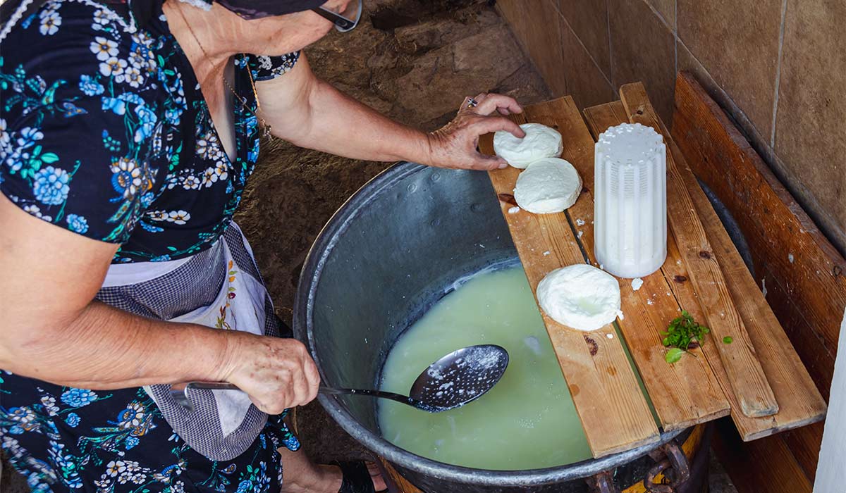 Halloumi cheese making in Sofia And Andreas Traditional House in small village Letymbou. Pic: Shutterstock
