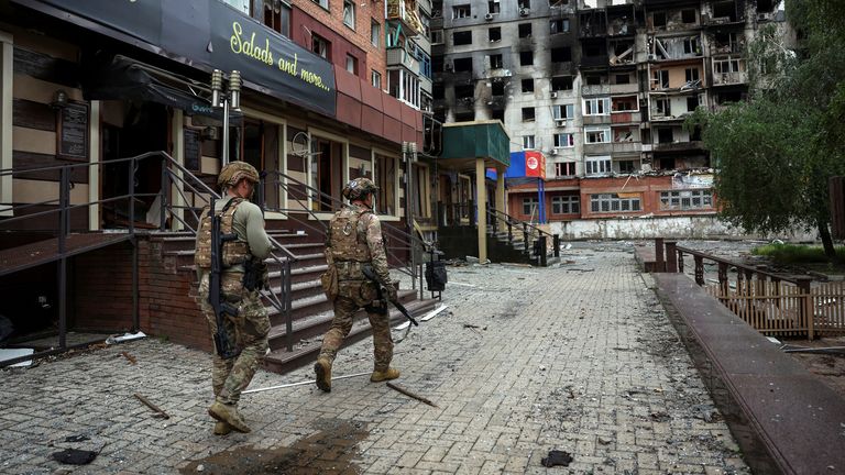 Members of the White Angel unit of Ukrainian police officers who evacuate people from the frontline towns and villages, check an area for residents, amid Russia's attack on Ukraine, in the frontline town of Pokrovsk in Donetsk region, Ukraine May 21, 2025. REUTERS/Anatolii Stepanov