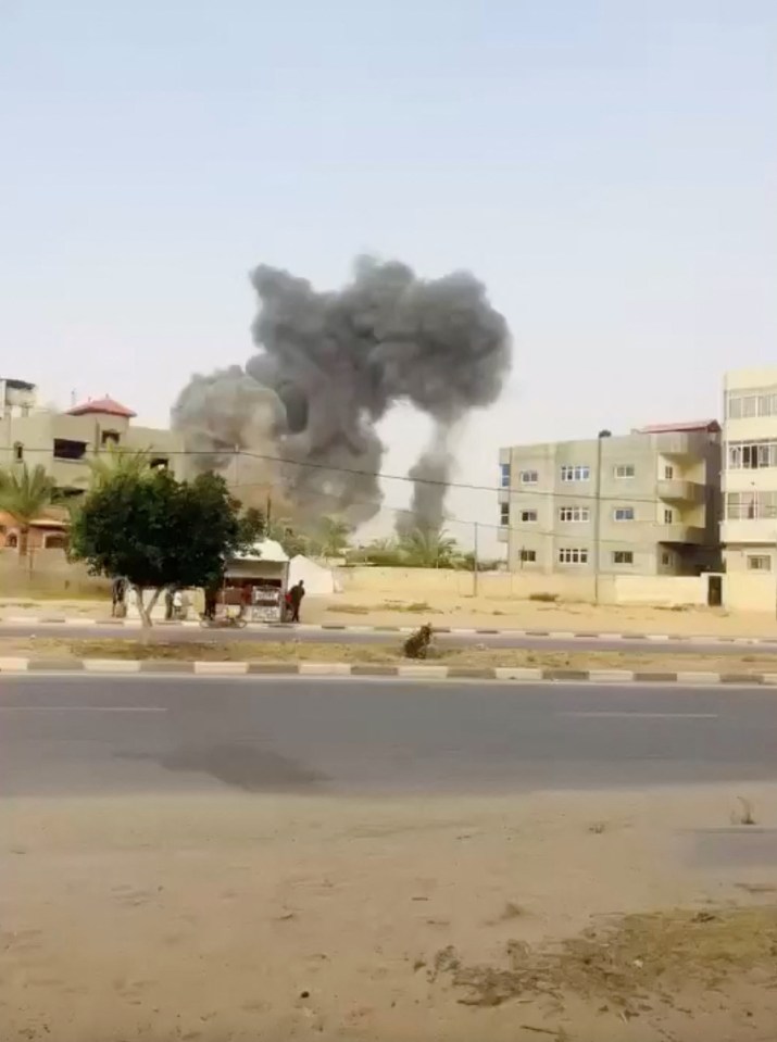 Smoke billows from a damaged hospital in Khan Younis, Gaza Strip.