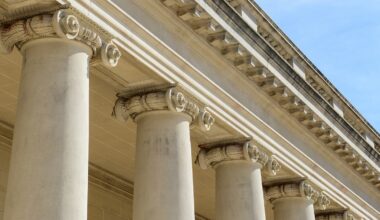Pillars of Education with a Blue Sky Background