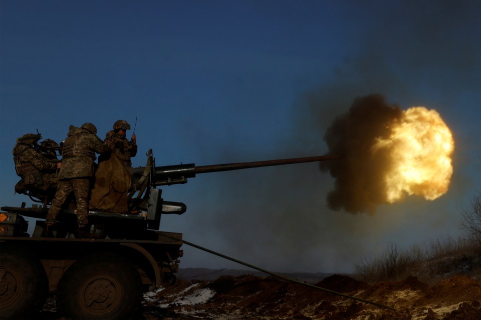 Ukrainian soldiers firing an anti-aircraft weapon in Bakhmut.