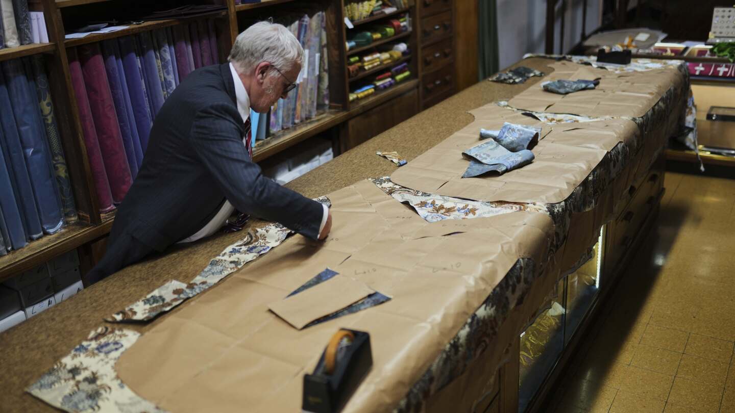 These papal tailors aren't expecting a traditional order for new cassocks to outfit the next pope