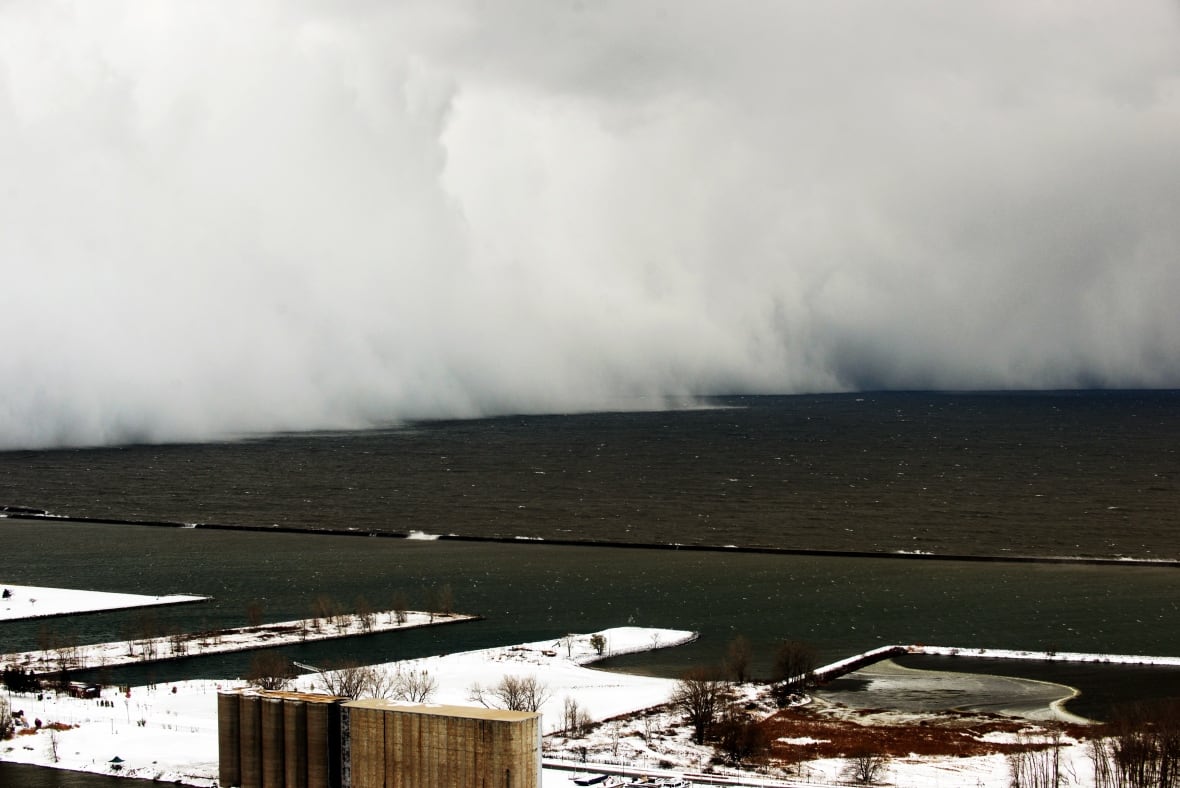 A lake-effect snow storm with freezing temperatures produces a wall of snow travelling over Lake Erie into Buffalo, New York. November 18, 2014.  A whirlpool of frigid, dense air known as a "polar vortex" descended Tuesday into much of the Northeastern U.S.  