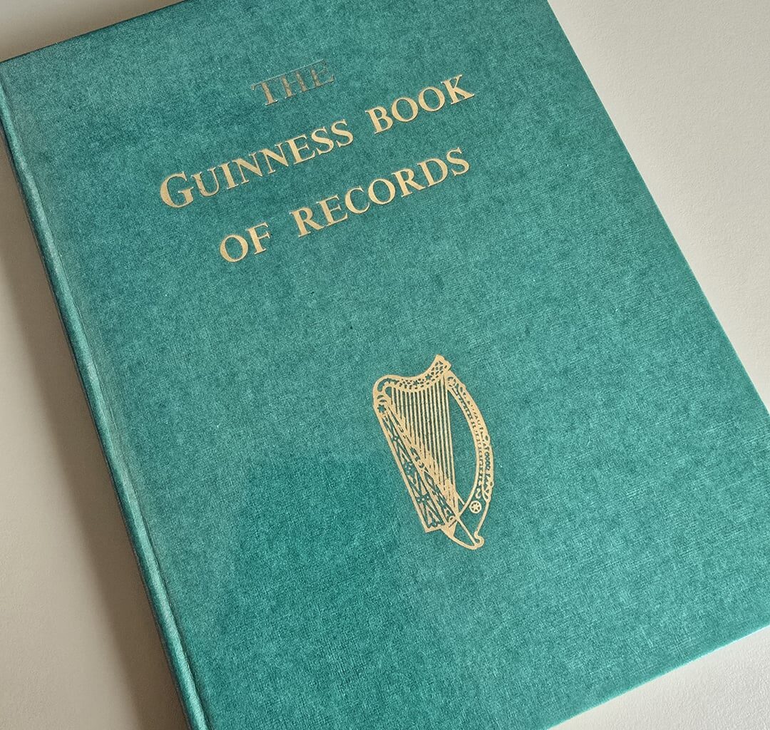 A First Edition, First Impression of the Original Guinness Book of Records from 1955. One of the rarest books I own. It even has a letter from Guinness, as it was sent as a gift to a pub for people to settle arguments. It's in near-perfect condition so clearly wasn't used much!