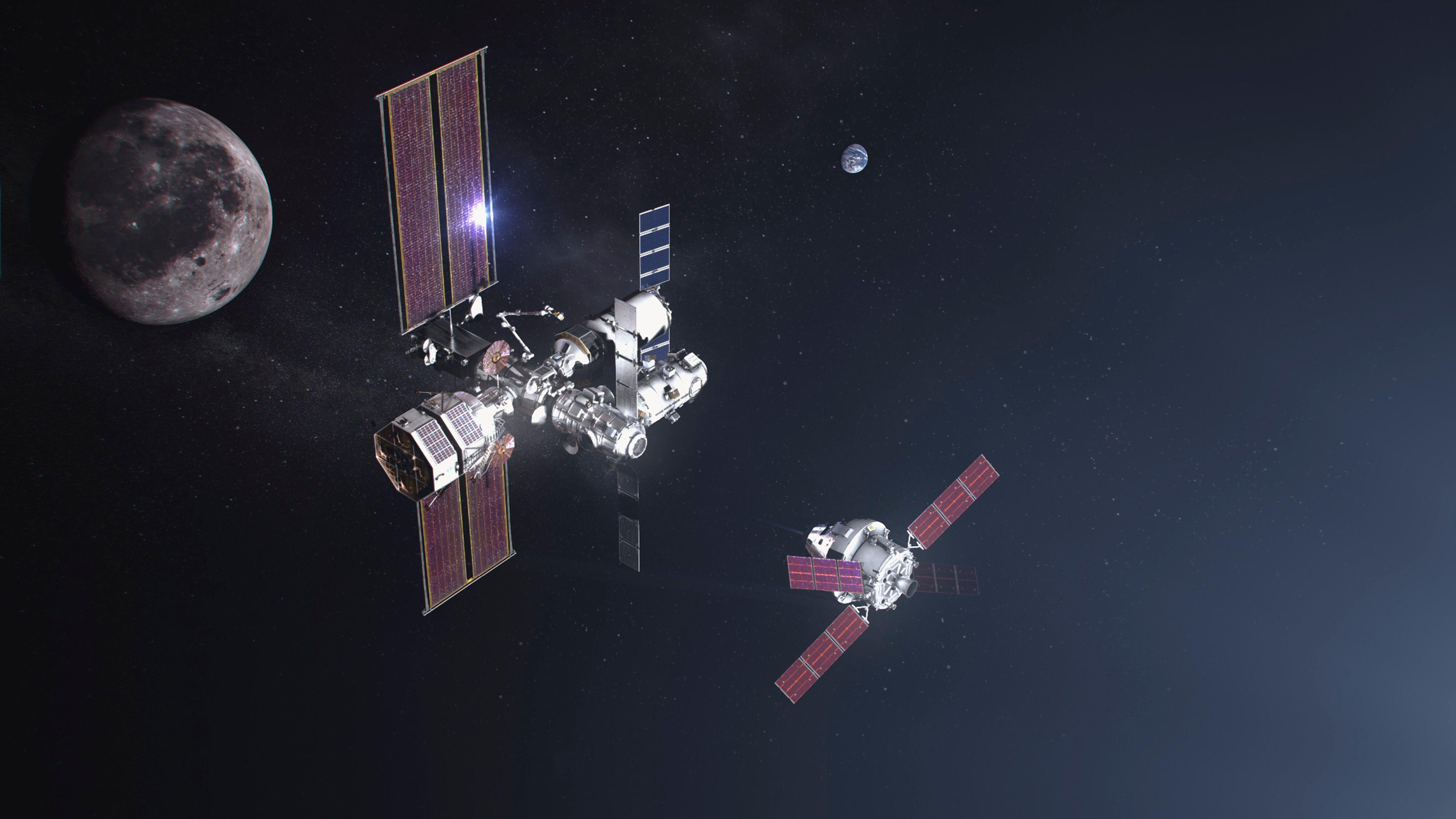 Illustration of the SpaceX Gateway space station and Artemis spaceship in lunar orbit.