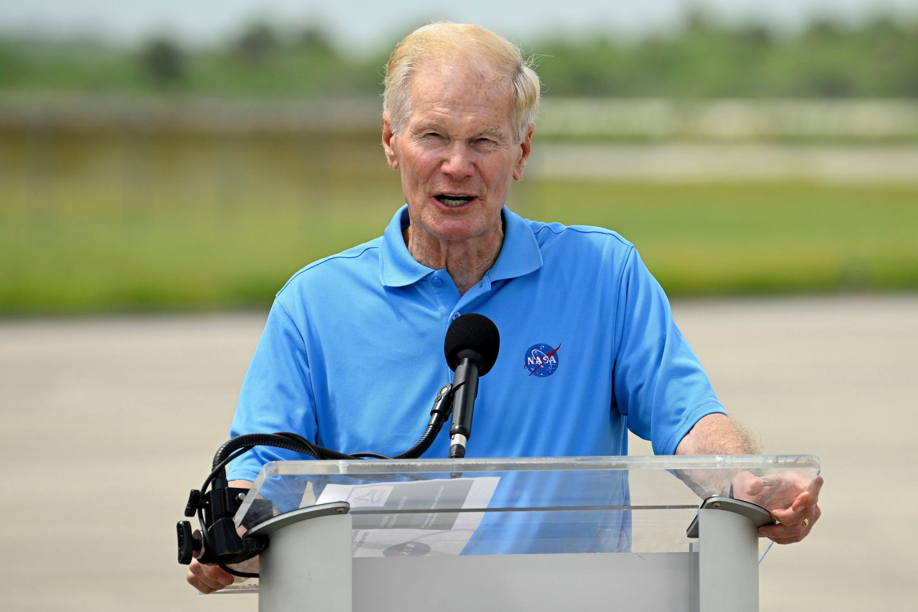 NASA Administrator Bill Nelson speaking at a podium.