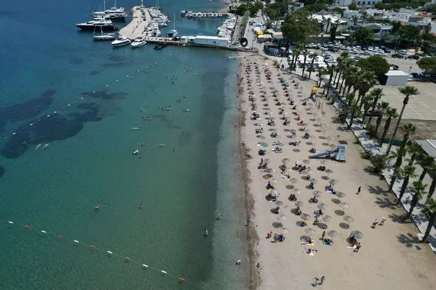 A general view of crowds of vacationers filling the beach in Mugla, Turkiye