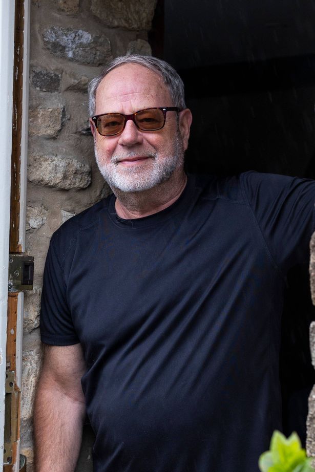A man standing in a doorway