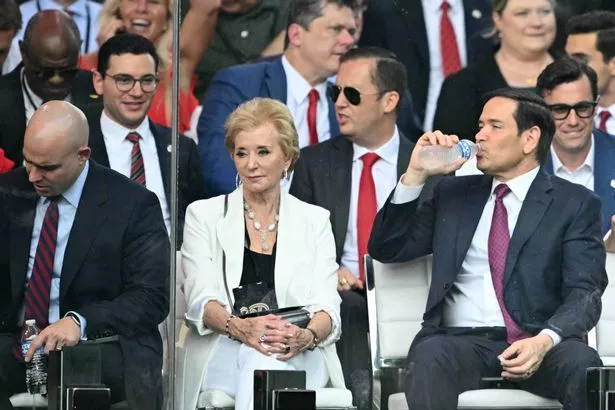 US Secretary of State Marco Rubio (R) and US Secretary of Education Linda McMahon attend the Army 250th Anniversary Parade