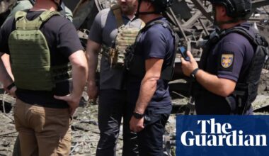 Ukraine war briefing: Russian attack on eastern region kills at least 19 as Zelenskyy flies in for Nato summit | Ukraine