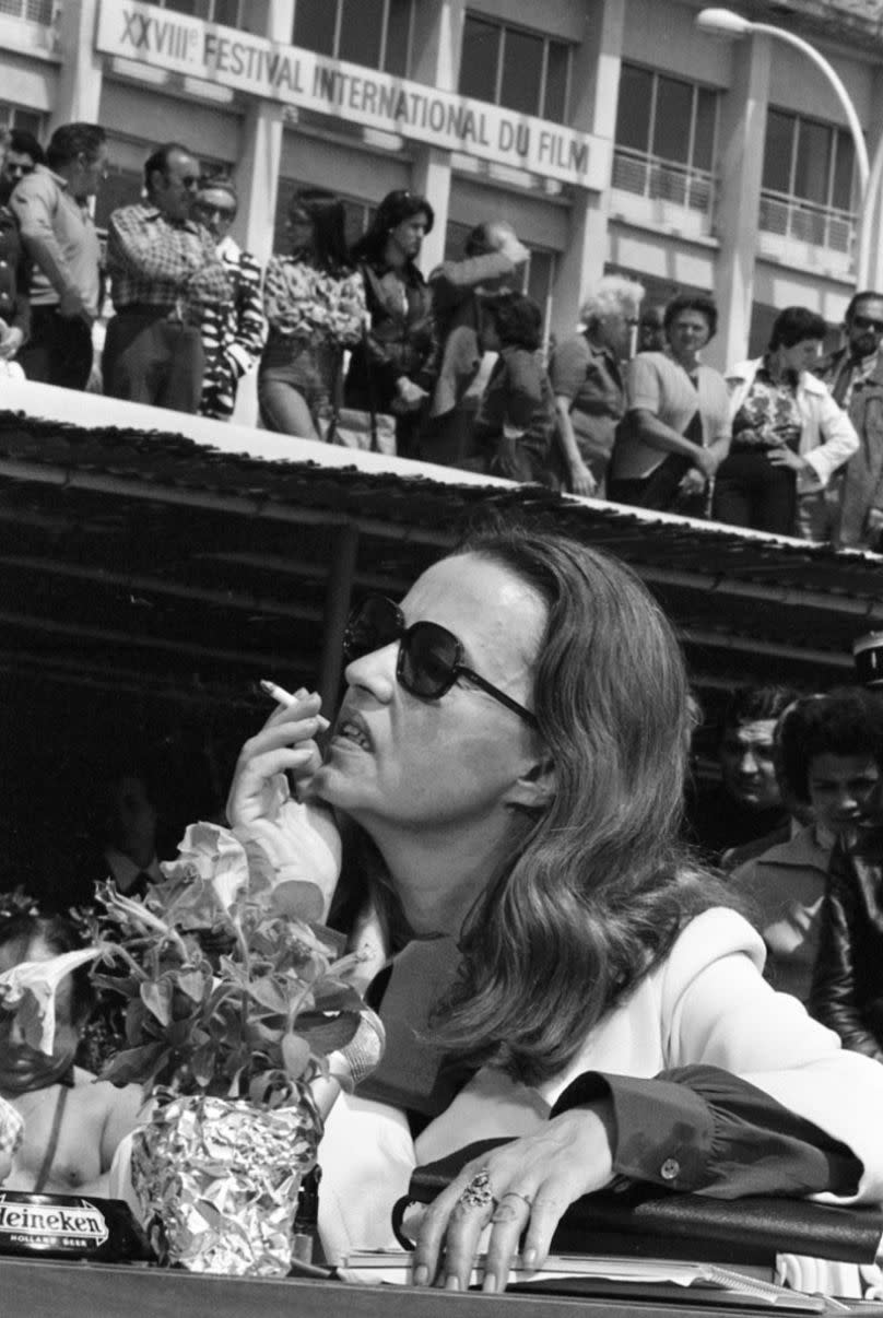 Jury president Jeanne Moreau smokes a cigarette at the Cannes Festival in France, on 12 may 1975