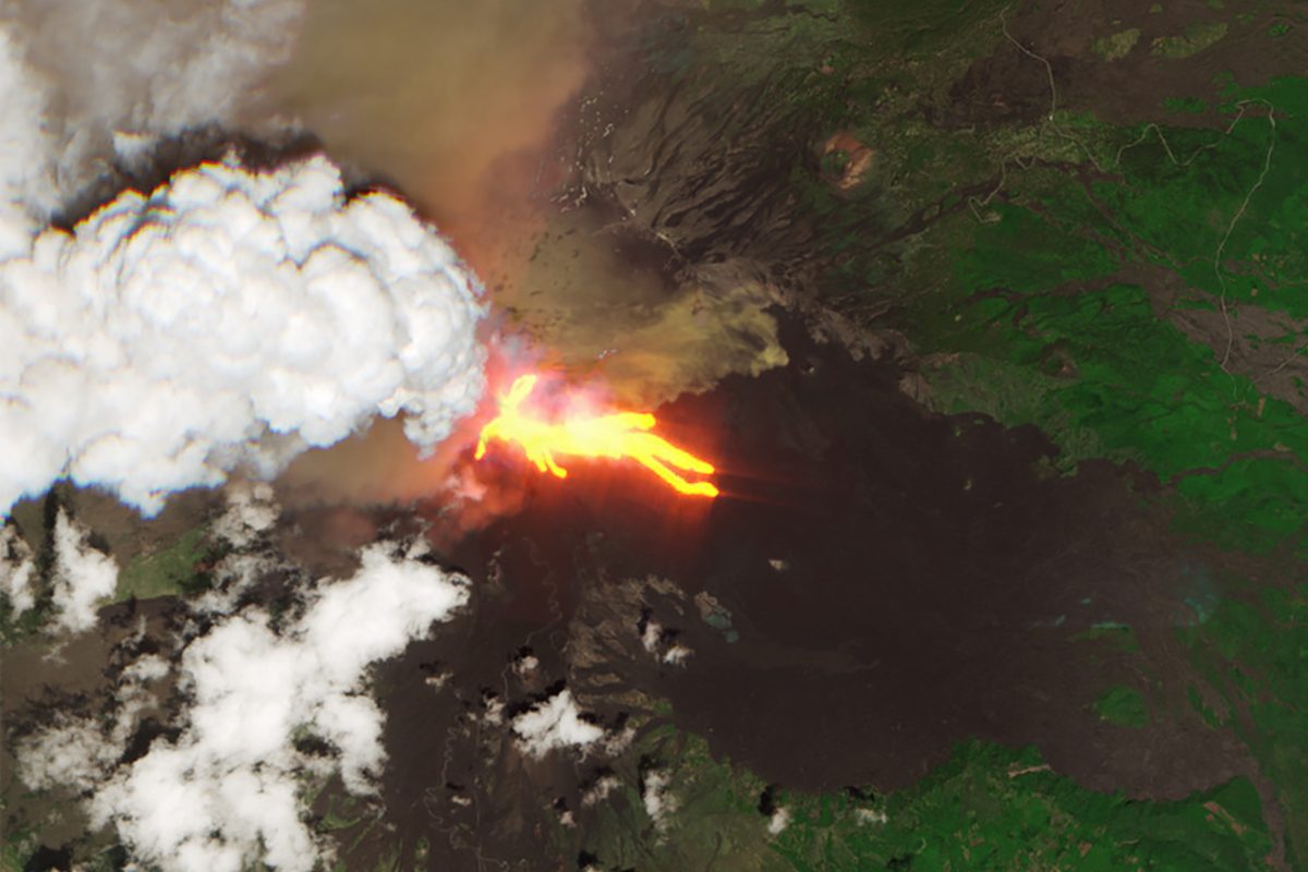 Mount Etna's eruption captured from space. Dense plume sends tourists fleeing on island of Sicily