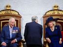 Britain's King Charles III and Queen Camilla speak with Canadian Prime Minister Mark Carney during the opening of the first session of the 45th Parliament of Canada at the Senate of Canada in Ottawa on May 27, 2025. (Victoria Jones photo)