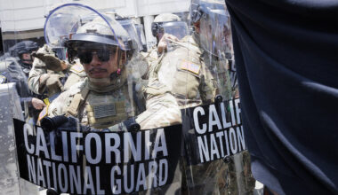 Federal law enforcement shown in tactical gear.
