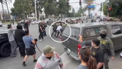 Los Angeles protester arrested by border patrol says he was attacked – video