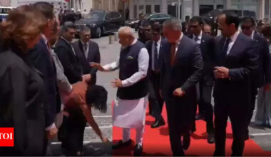 Watch: Nicosia council member touches Modi's feet - PM's Cyprus visit | India News