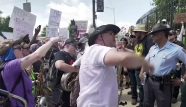 Musicians surround Proud Boys, drown them out with tubas at 'No Kings' protest in Atlanta