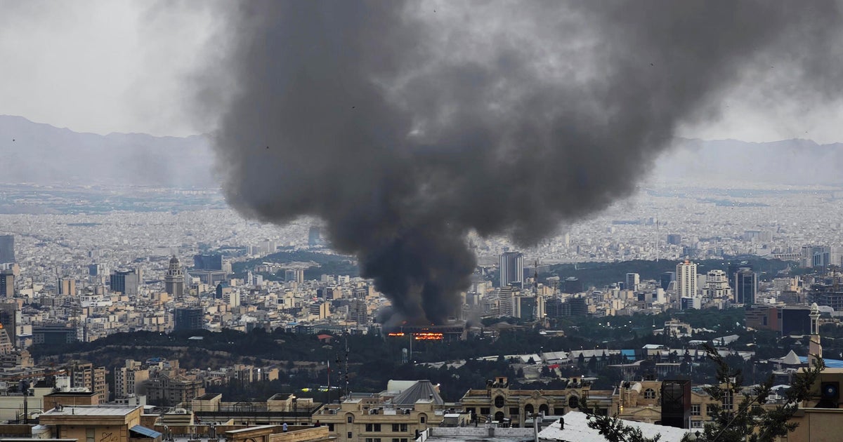 Israel strikes Iranian state TV, warns people to evacuate Tehran after accusing Iran of targeting civilians