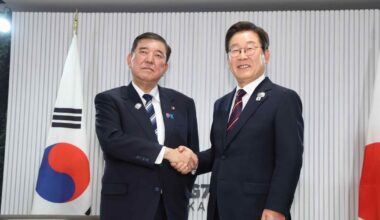 Japan, South Korea leaders vow to boost ties in 1st in-person meeting