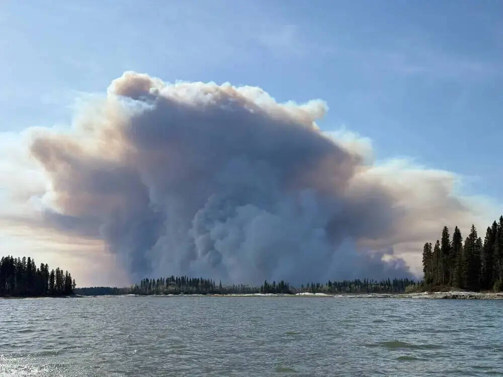 Wildland fires like this one near Pimicikamak Cree Nation earlier this year, aren’t only increasing as a result of climate change. They add to it as well.