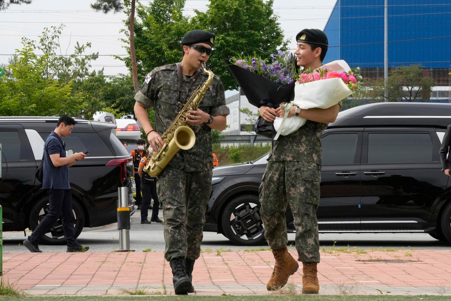 In South Korea, fans celebrate end of military service for K-pop's BTS