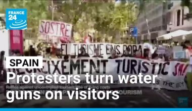Spaniards turn water guns on visitors in Barcelona and Mallorca to protest mass tourism