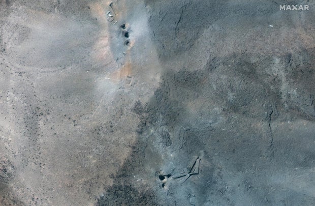 07-after-airstrikes-close-up-view-of-holes-and-craters-on-ridge-at-fordow-underground-complex-iran-22jun2025-ge1.jpg