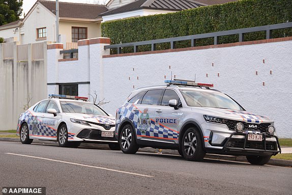 Police are seen at a house in Clayfield, Brisbane, Friday, June 27, 2025. A man who was stabbed to death is believed to have known his attacker, a 15-year-old boy, according to Queensland Police. (AAP Image/Fraser Barton) NO ARCHIVING, IMAGE TAKEN BY JOURNALIST 14852209