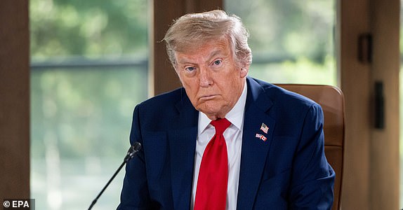 epa12179569 US President Donald Trump attends the G7 Global Economic Outlook working session at the G7 Leaders' Summit in Kananaskis, Alberta, Canada, 16 June 2025.  EPA/SPENCER COLBY