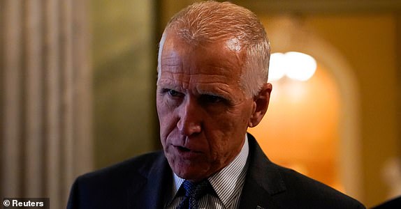 U.S. Senator Thom Tillis (R-NC) speaks to reporters as Republican lawmakers struggle to pass U.S. President Donald Trump's sweeping spending and tax bill, on Capitol Hill in Washington, D.C., U.S., June 27, 2025. REUTERS/Elizabeth Frantz